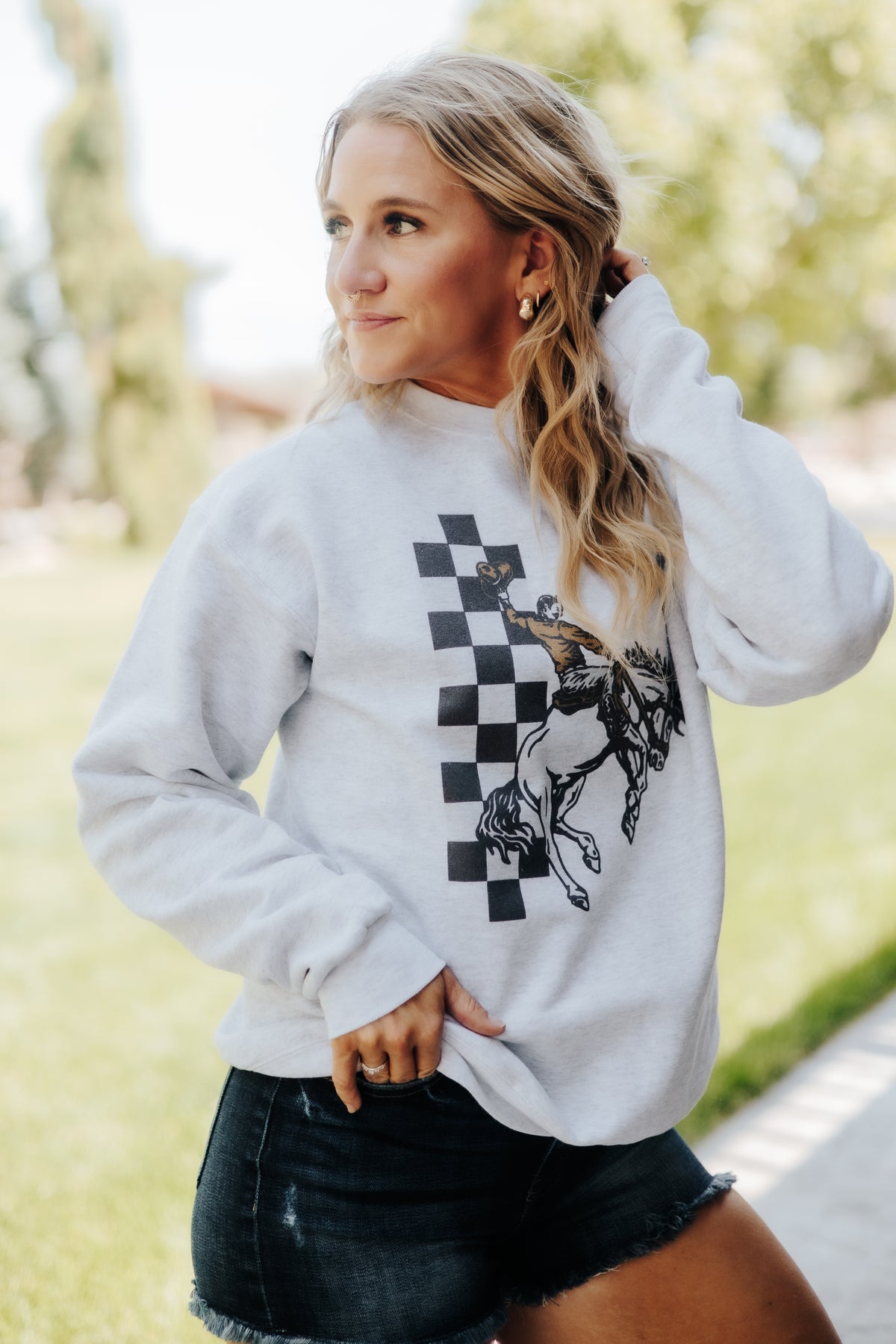 Checkered Cowboy Sweatshirt with Horse and Rider Graphic Design